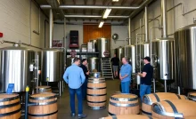 Brewery interior showing brewing equipment affected by tariffs