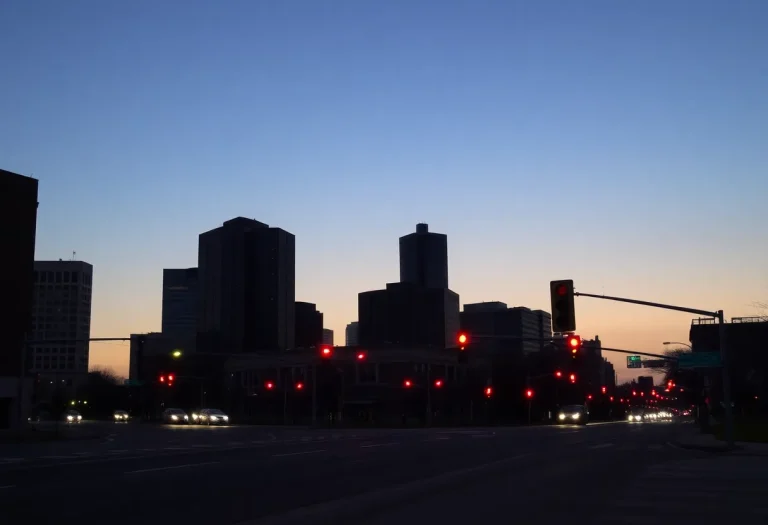 Dark cityscape of Grand Rapids during a power outage illustrating empty streets and non-functioning traffic signals.