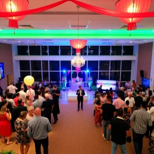 Interior view of the new event center in Roosevelt Park, Grand Rapids, with guests enjoying an event.