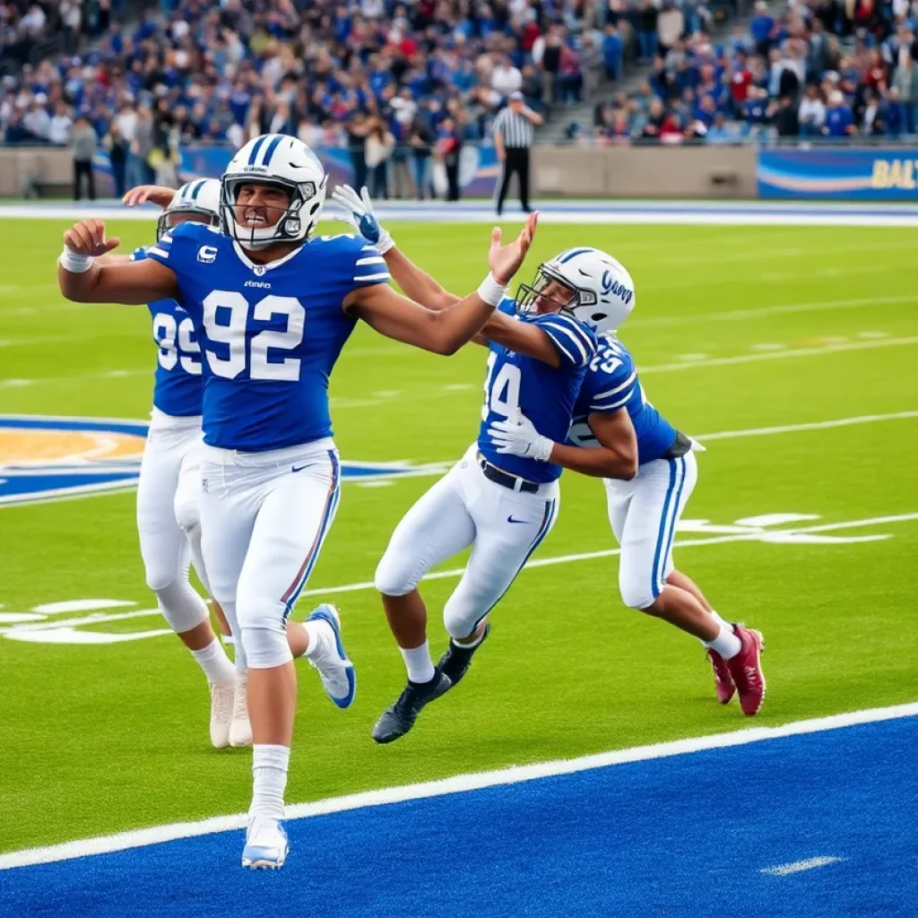 GVSU football players celebrating a touchdown on the field
